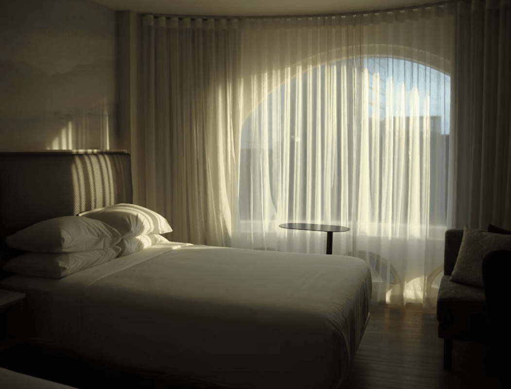 Elegant custom Roman blinds in a luxury room
